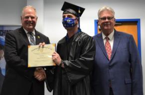 Robert Riso, Transitioning Offender Graduate with TCC President Murdaugh and FDC Secretary Inch