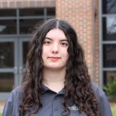 a young woman standing